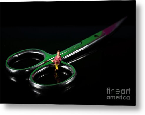 Fashionable Metal Print featuring the photograph Girl sitting on nail scissors. Miniature people. Black background. Concept of health education. Macro by Pablo Avanzini