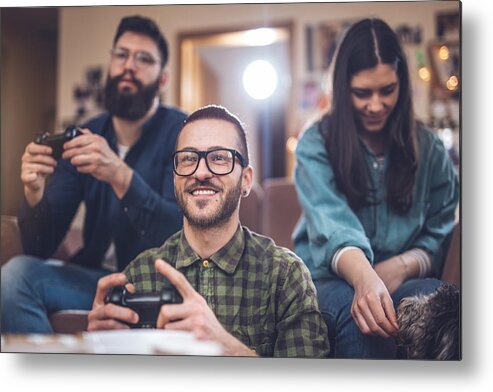 Plaid Shirt Metal Print featuring the photograph Good friends playing games at home by FluxFactory