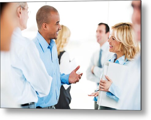 People Metal Print featuring the photograph Group of successful businesspeople standing and talking. by Skynesher