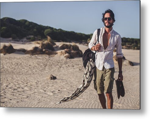 Hipster Metal Print featuring the photograph Handsome man standing at the beach by South_agency