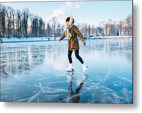 People Metal Print featuring the photograph Ice skating on the frozen lake by Andrey Danilovich