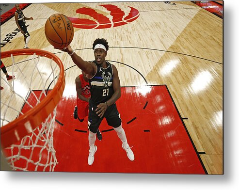 Jrue Holiday Metal Print featuring the photograph Jrue Holiday by Scott Audette