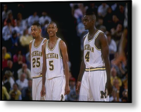 Looking Metal Print featuring the photograph Juwan Howard, Jalen Rose, and Chris Webber by Duane Burleson