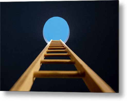 Risk Metal Print featuring the photograph Ladder though hole in ceiling by PM Images