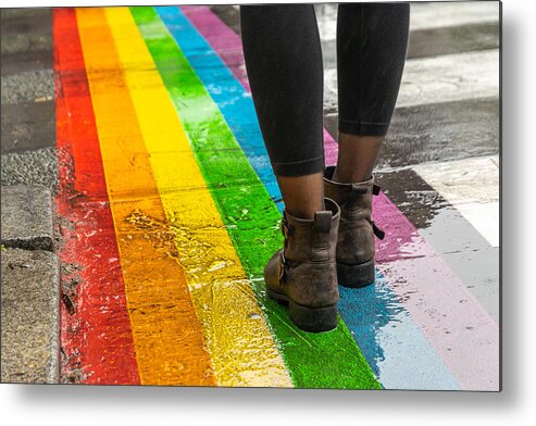 Event Metal Print featuring the photograph Legs walking on Gay rainbow crosswalk. by Beli_photos