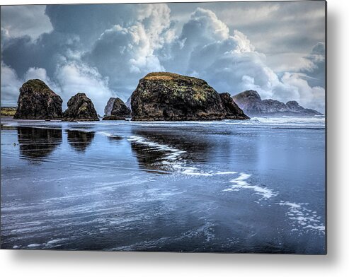 Clouds Metal Print featuring the photograph Low Tide at the Pacific Seastacks by Debra and Dave Vanderlaan