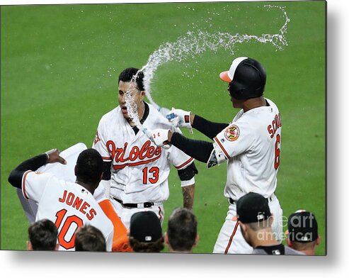 People Metal Print featuring the photograph Manny Machado, Jonathan Schoop, and Adam Jones by Rob Carr