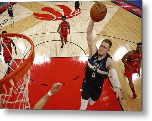 Donte Divincenzo Metal Print featuring the photograph Milwaukee Bucks v Toronto Raptors by Scott Audette