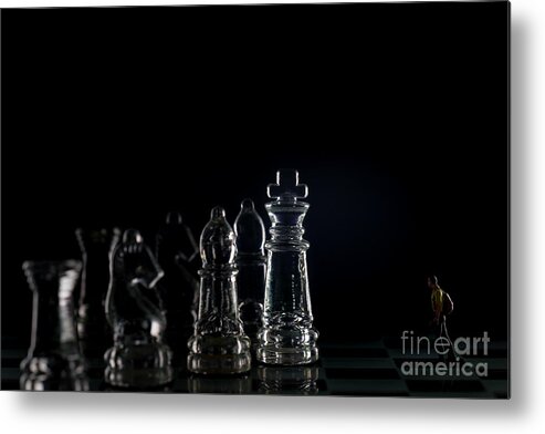 Rule Metal Print featuring the photograph Miniature figure people as businessman standing face to face with King chess piece on chessboard. macro by Pablo Avanzini