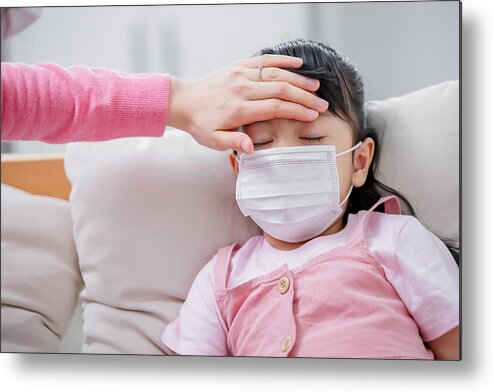 Pandemic Metal Print featuring the photograph Mom touch kid to check her fever by RyanKing999