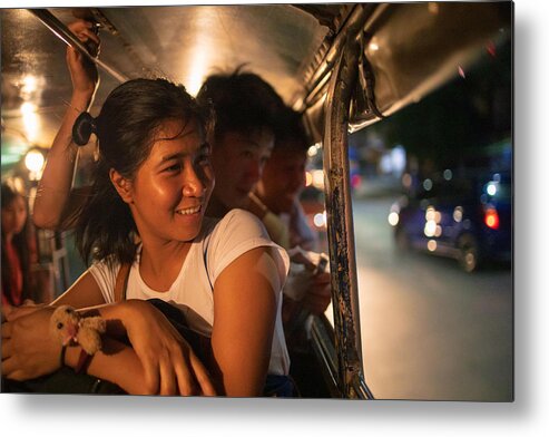 Asian And Indian Ethnicities Metal Print featuring the photograph Multi-Ethnic Asian friends riding jeepney in Manila at night by Satoshi-K
