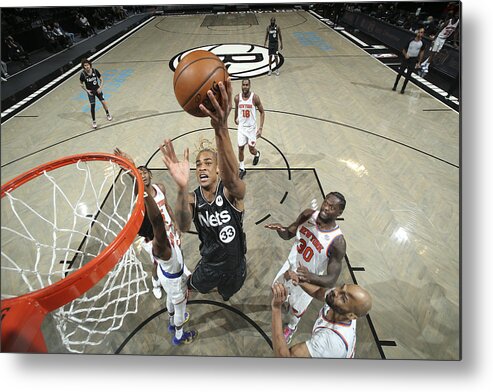 Nicolas Claxton Metal Print featuring the photograph New York Knicks v Brooklyn Nets by Nathaniel S. Butler