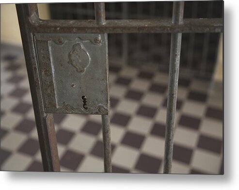 Punishment Metal Print featuring the photograph One cell door lock by Cristinairanzo