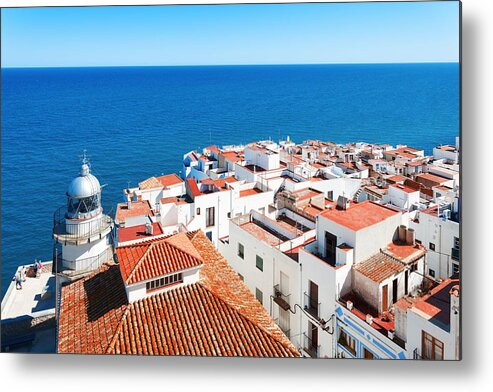 Spain Metal Print featuring the photograph Peniscola Castle lighthouse by Songquan Deng