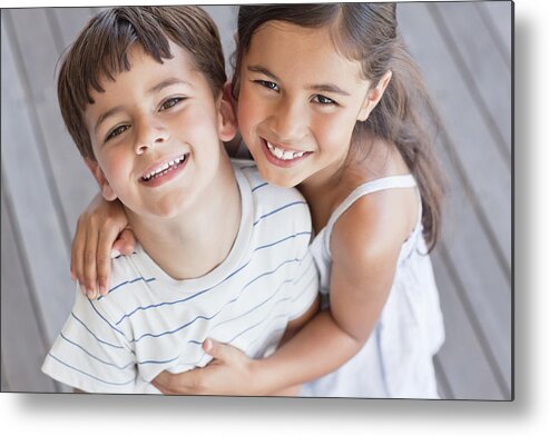 4-5 Years Metal Print featuring the photograph Portrait of brother and sister smiling by OJO Images