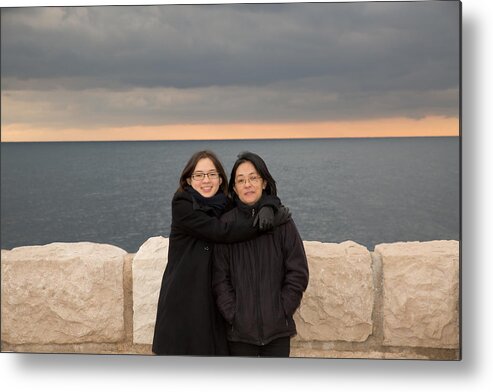People Metal Print featuring the photograph Portrait of mother and daughter hugging by Jean-Marc PAYET