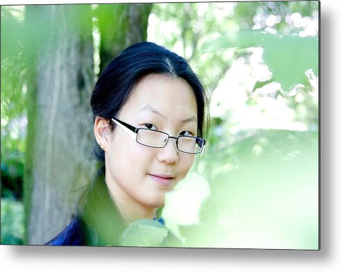 People Metal Print featuring the photograph Portrait of young woman in park by Sigrid Gombert