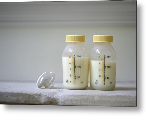 Milk Metal Print featuring the photograph Pumped breast milk by Ceneri