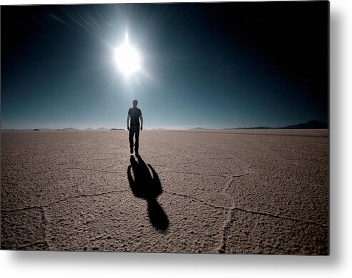 Latin America Metal Print featuring the photograph Rear view of a man walking on a salt flat, Salar De Uyuni, Bolivia by Hans Neleman