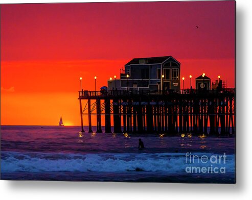 #sunset #oceanside #pier #sailboat #seascape Metal Print featuring the photograph Sailboat at Sunset by Rich Cruse