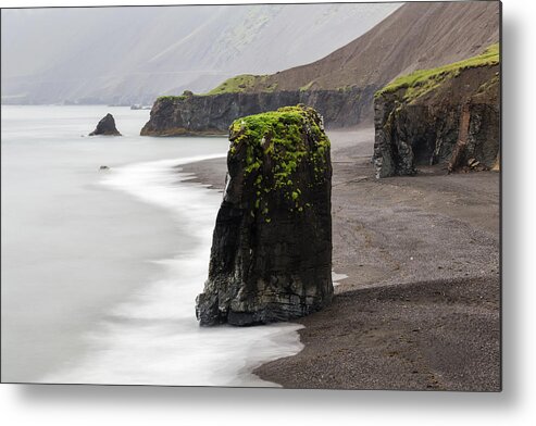 Water's Edge Metal Print featuring the photograph Sea stack rock formations near beach cliffs by Jeremy Woodhouse