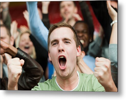 Young Men Metal Print featuring the photograph Shouting man at football match by Image Source