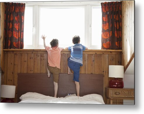 4-5 Years Metal Print featuring the photograph Siblings looking out of bedroom window by Compassionate Eye Foundation/Natasha Alipour Faridani