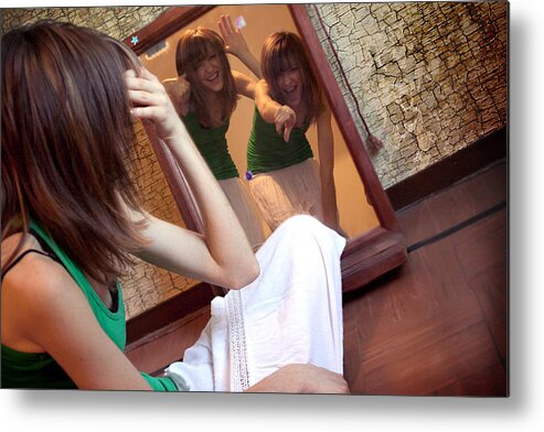 Three Quarter Length Metal Print featuring the photograph Side profile of a young woman looking at her reflections in a mirror, Buenos Aires, Argentina by WIN-Initiative/Neleman