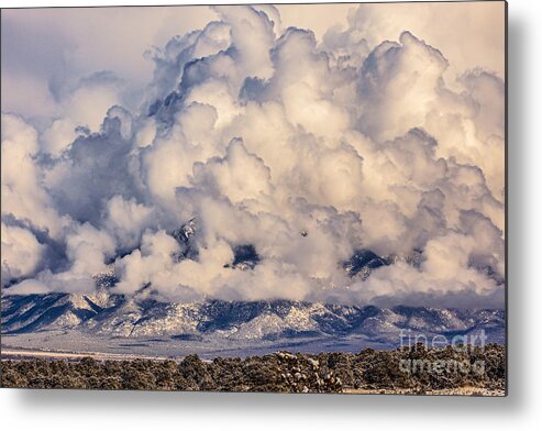 Taos Metal Print featuring the photograph Snow Clouds over Taos Mountain by Elijah Rael