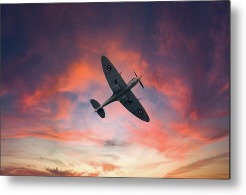 Eastbourne International Airshow Metal Print featuring the photograph Spitfire flying at sunset by Andrew Lalchan