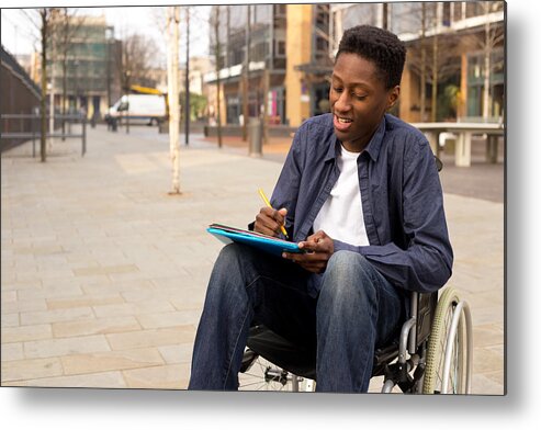 Young Men Metal Print featuring the photograph Student In A Wheelchair by Michaelpuche