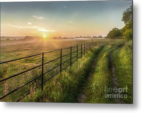 Norfolk Metal Print featuring the photograph Sunrise over rural fields fences and track in Norfolk UK by Simon Bratt
