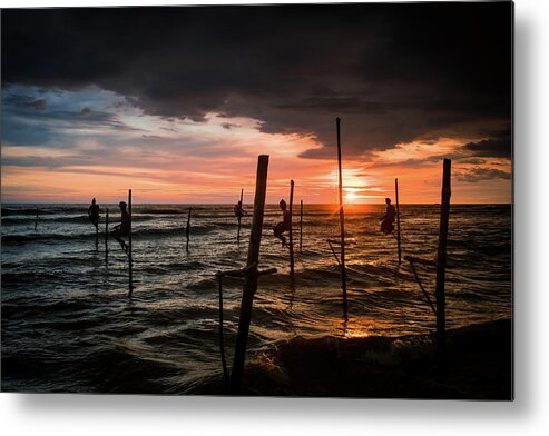Fisherman Metal Print featuring the photograph Sunset and Stilt Fishermen by Arj Munoz