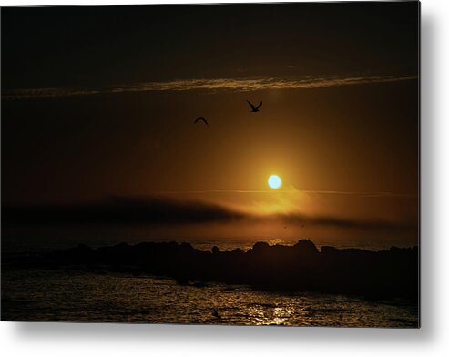 Sunset Metal Print featuring the photograph Sunset over the ocean by Micah Offman