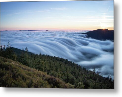 Courage Metal Print featuring the photograph Sunset with floating blue waves of clouds by Vaclav Sonnek