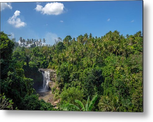 Tropical Rainforest Metal Print featuring the photograph Tegenungan waterfall, it is one of the many tourist places and destination in Bali by Shaifulzamri
