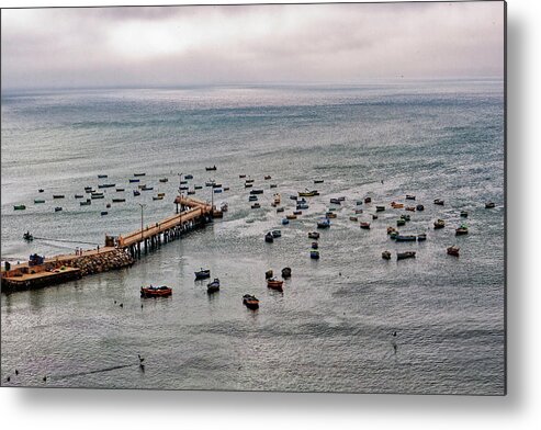 Peru Metal Print featuring the photograph The Fleet and Pier by Ron Dubin