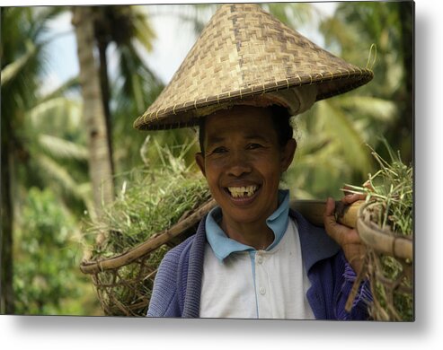Indonesia Metal Print featuring the photograph The Life She Carries by Damian Morphou