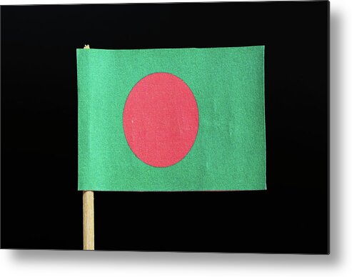  Bangladesh Metal Print featuring the photograph The national flag of Bangladesh on toothpick on black background. A red disc on a green field by Vaclav Sonnek