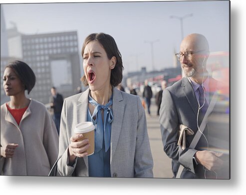 White People Metal Print featuring the photograph Tired businesswoman with coffee yawning on sunny morning urban pedestrian bridge by Caia Image