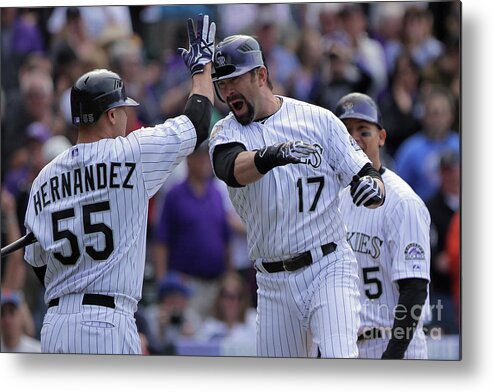 Relief Pitcher Metal Print featuring the photograph Todd Helton and Ramon Hernandez by Doug Pensinger