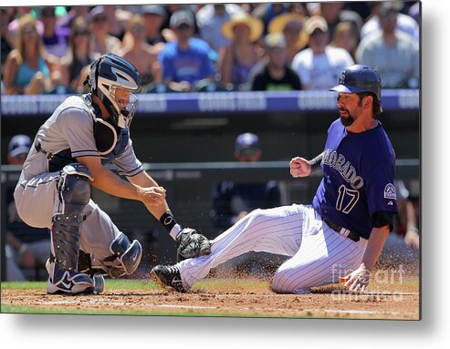 Second Inning Metal Print featuring the photograph Todd Helton, Nick Hundley, and Jonathan Herrera by Doug Pensinger