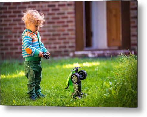 Toddler Metal Print featuring the photograph Toddler with toy car by © Razvan Ciuca