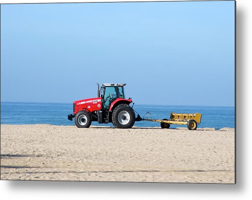 Beach Metal Print featuring the photograph Tractor Cleaning the Sand on the Beach by Mark Stout