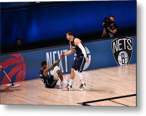 Playoffs Metal Print featuring the photograph Trey Burke by David Dow