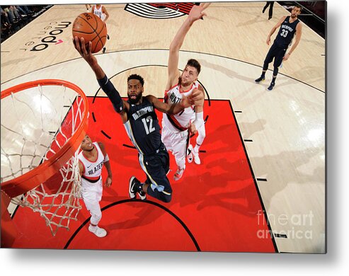 Nba Pro Basketball Metal Print featuring the photograph Tyreke Evans by Cameron Browne