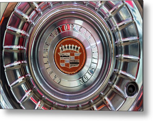 Cadillac Metal Print featuring the photograph Vintage Cadillac De Ville Convertible 1967 wheel with emblem by Viktor Wallon-Hars