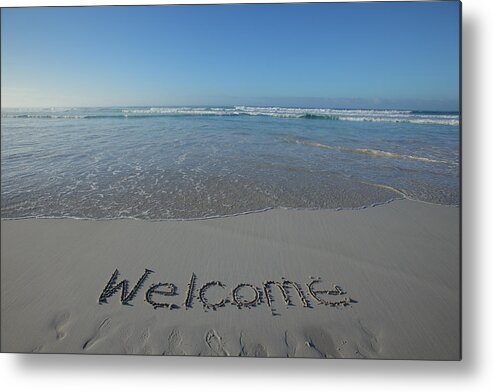 Water's Edge Metal Print featuring the photograph Welcome written on a clean beach by John White Photos