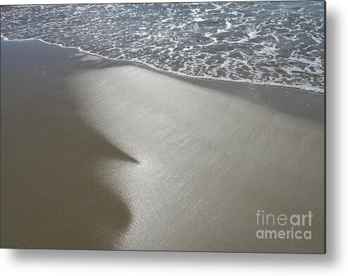 Sandy Beach Metal Print featuring the photograph Wet sand, sea water and reflections of sunlight by Adriana Mueller