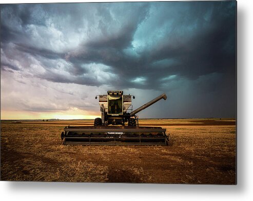 Oklahoma Metal Print featuring the photograph When the Work is Done - Combine Under Storm Clouds in Oklahoma by Southern Plains Photography
